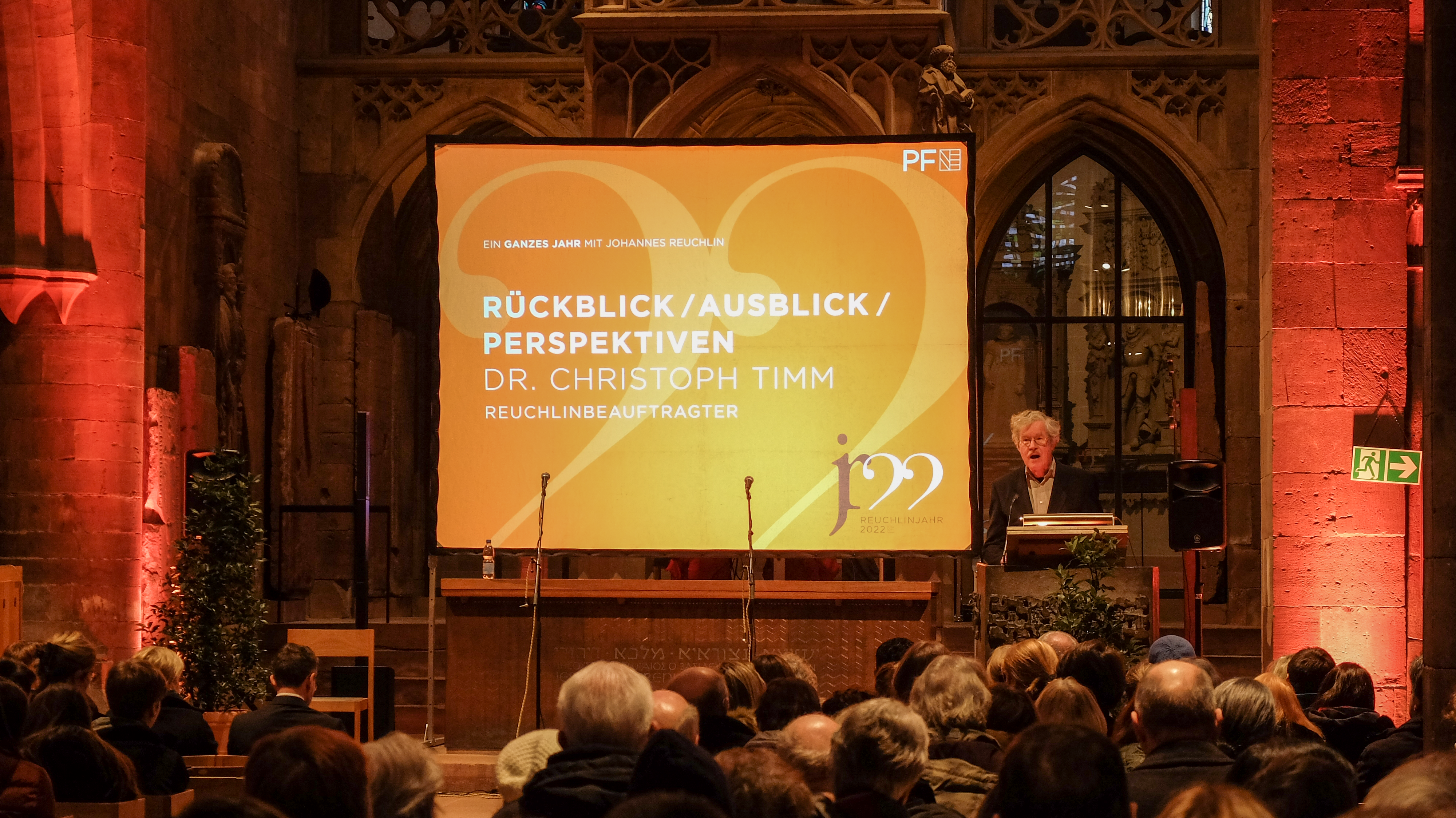 Doktor Christoph Timm bei der Abschlussveranstaltung des Reuchlinjahrs 2022 in der Schloßkirche Sankt Michael